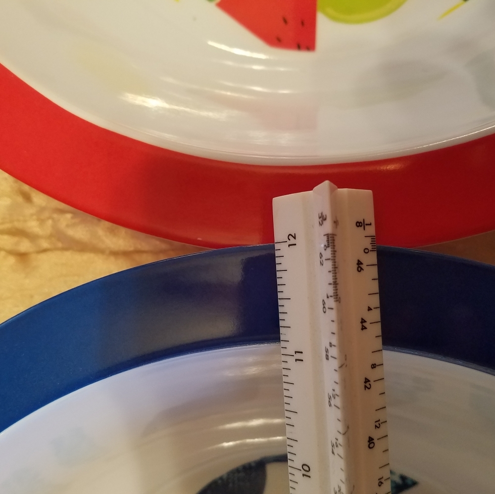 Bowls 
Hard plastic bowls 
One red with pictures o - Picture 3 of 10